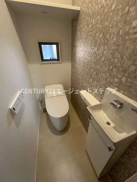 　トイレ　アクセントクロスを使ったトイレです